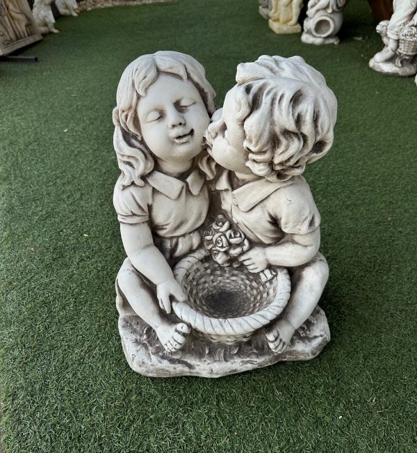 Statue Girl Boy Kissing